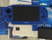 Sony PlayStation Vita PCH-2000 handheld console in Aqua Blue